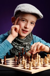 Kind Fotoshooting Schachspiel